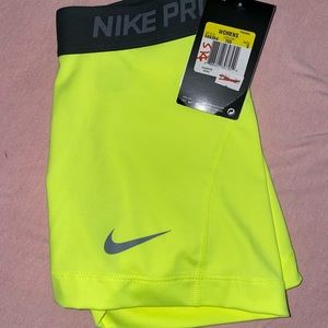 neon yellow/black nike pros